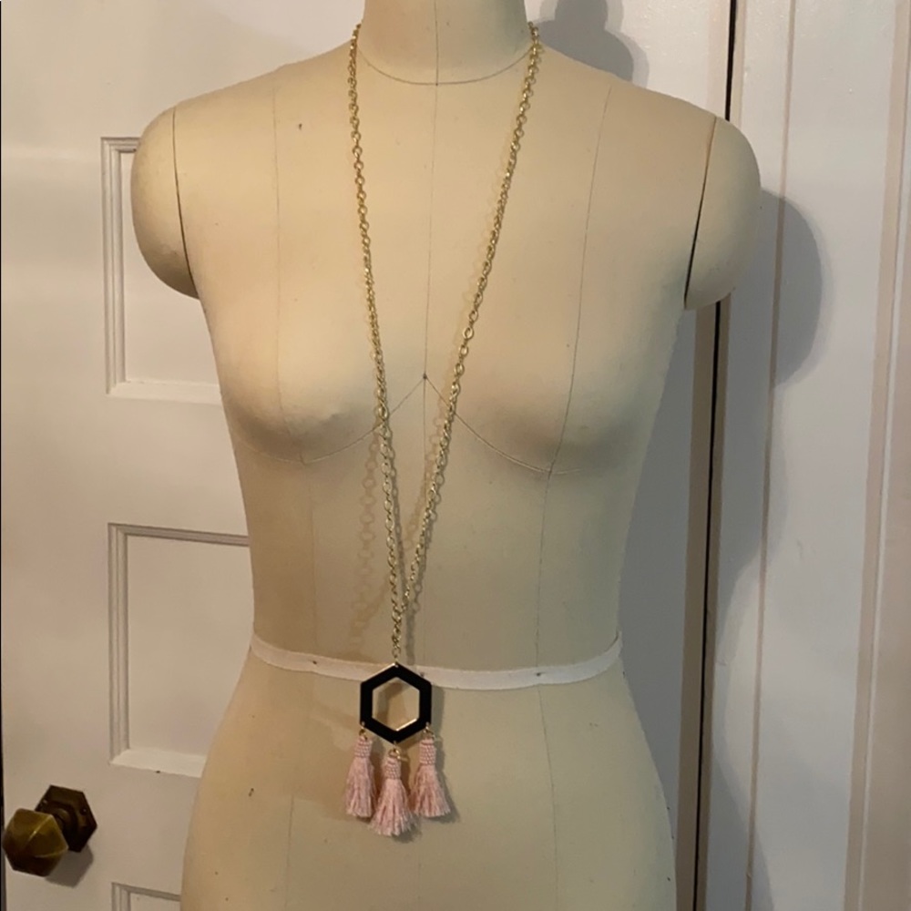 Gold necklace with pink tassels and hexagon